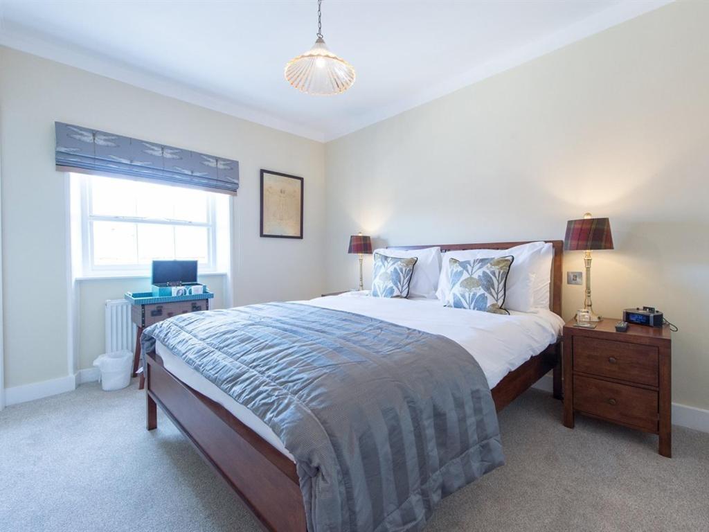 シュルーズベリー Darwin'S Townhouse Bed & Breakfast 部屋 写真 A bedroom at the hotel