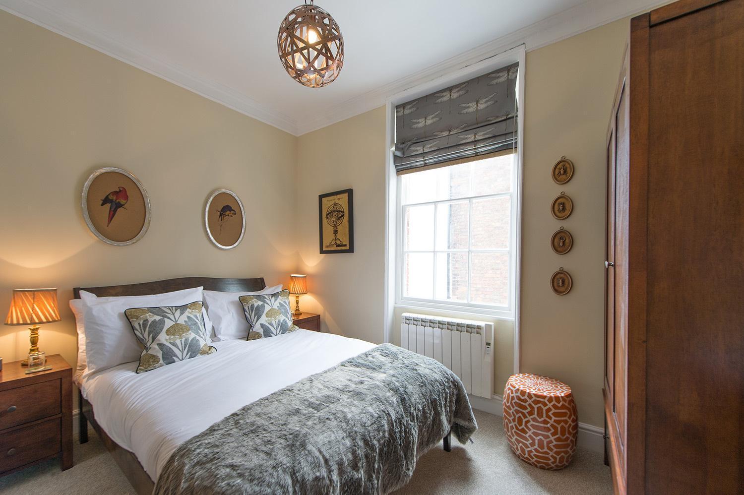 シュルーズベリー Darwin'S Townhouse Bed & Breakfast 部屋 写真 A bedroom at the hotel